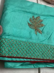 Elegant Teal Saree with Gold Embroidery