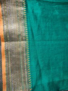 Elegant Teal Saree with Golden Border