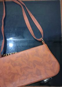 BROWN CHAINED SLING BAG