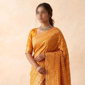 Vibrant Orange Embroidered  Saree