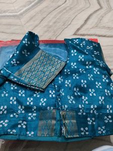 Beautiful Teal Saree with Intricate Gold Border