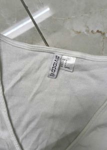 White V-Neck Twist Front Top