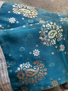 Organza Blue Colour Net Saree With Silver Print And Silver Lace