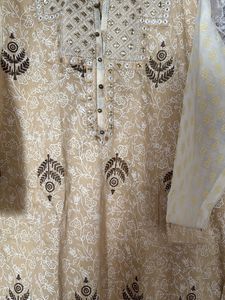Elegant Printed Kurta with Embellished Neckline