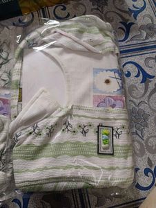 Girls Peach Kurta Set with Embellishments