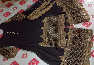 Black sharara suit with golden embroidery