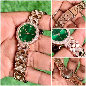 bvlgari Green Dial Watch with Rose Gold strap