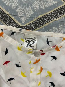 White Peplum Top with Umbrella Print