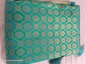 Beautiful semi kanjivaram Teal Saree with Gold Bro