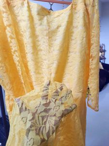 Yellow Lace Gown with sweet heart neck pattern