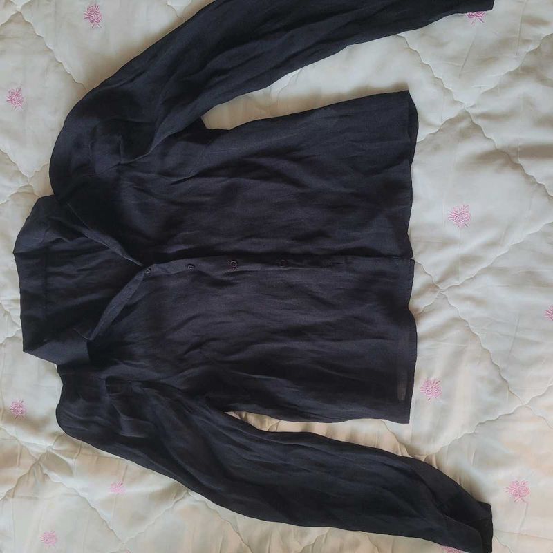 Black long sleeve shirt perfect for casual as well