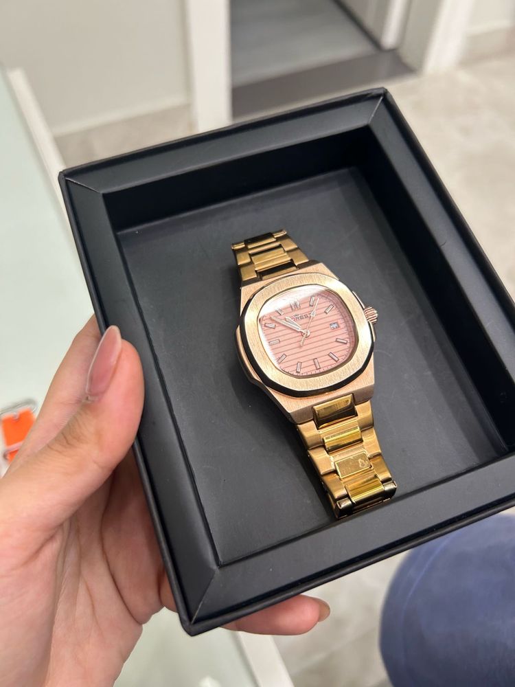 Elegant Rose Gold Watch with Pink Dial