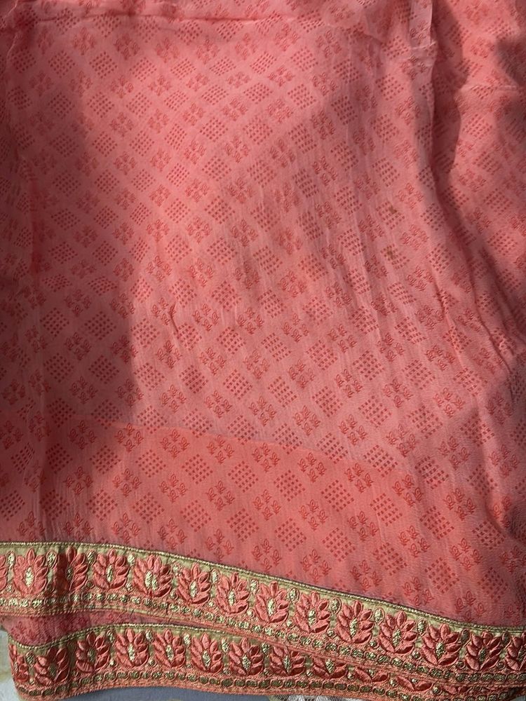 Elegant Peach Saree with Embroidered Border