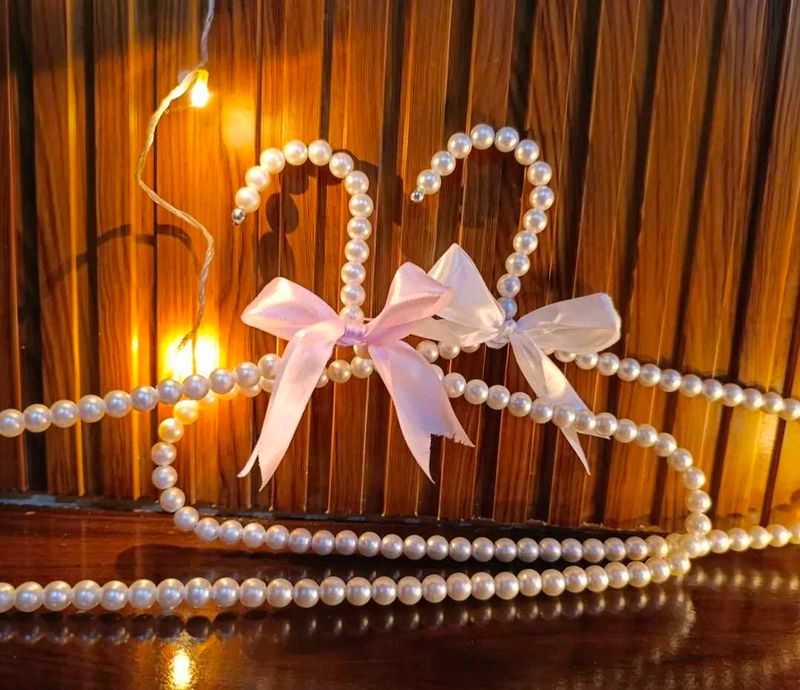 Elegant Pearl Hangers with Bow Accents