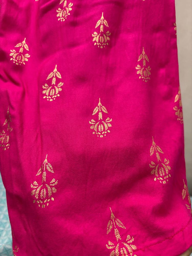 Vibrant Pink Saree with Gold Print