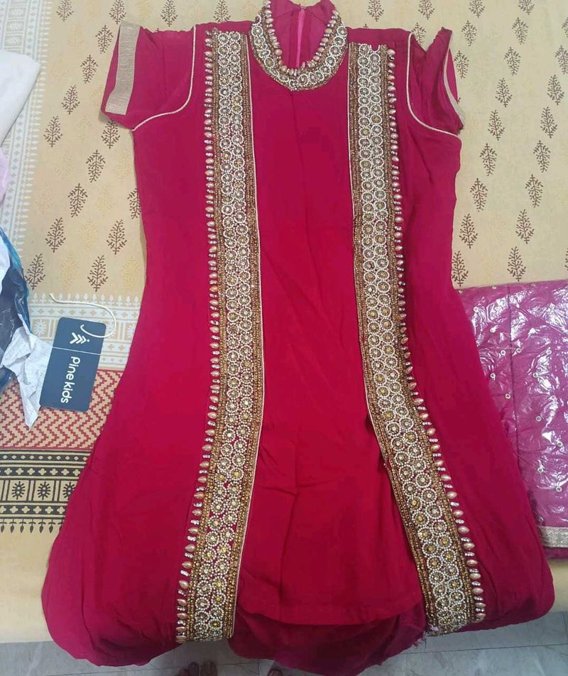 heavy work kurti and skirt with net dupatta