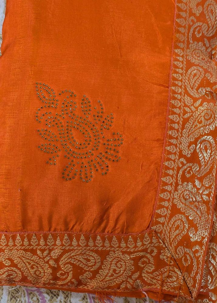 Stunning Orange Saree with Gold Border