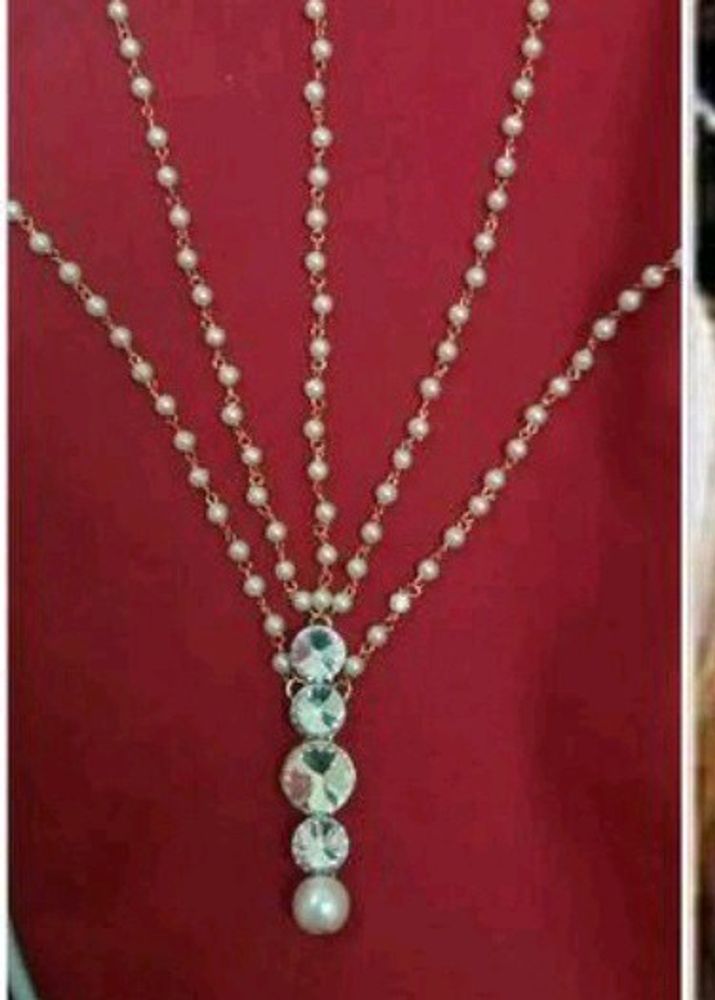 Elegant Pearl and Crystal Headpiece