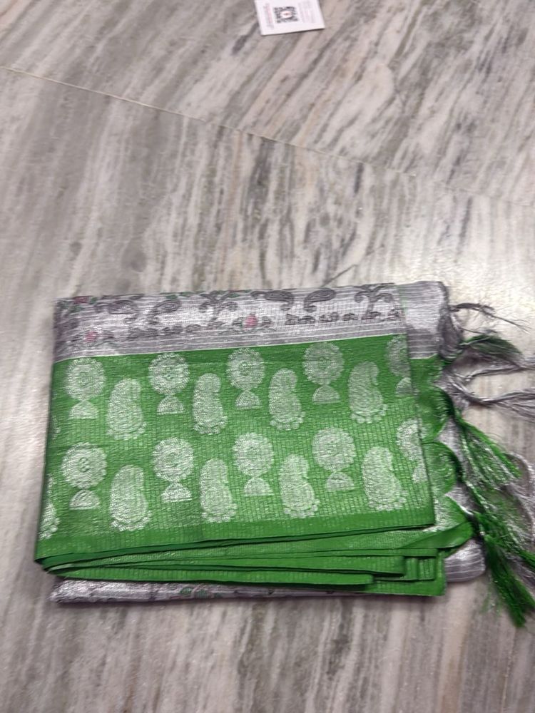 Elegant Green Saree with Silver Border