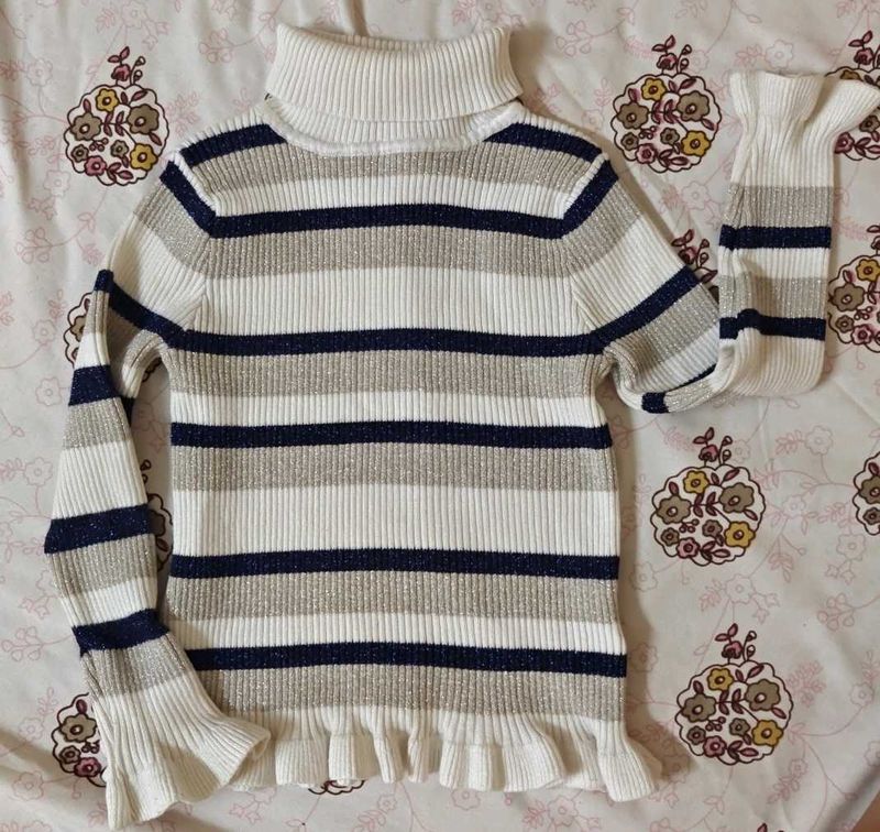 Striped Turtleneck Sweater with Ruffle Trim