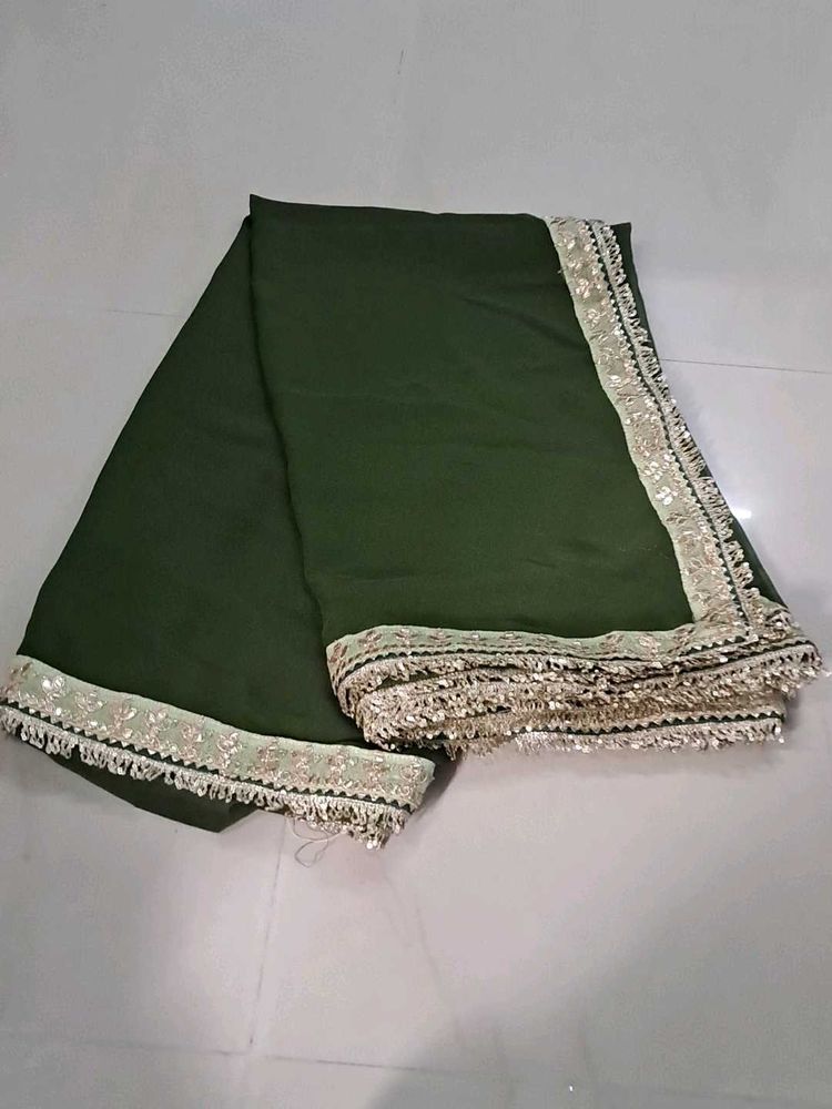 Elegant Green Saree with Embellished Border