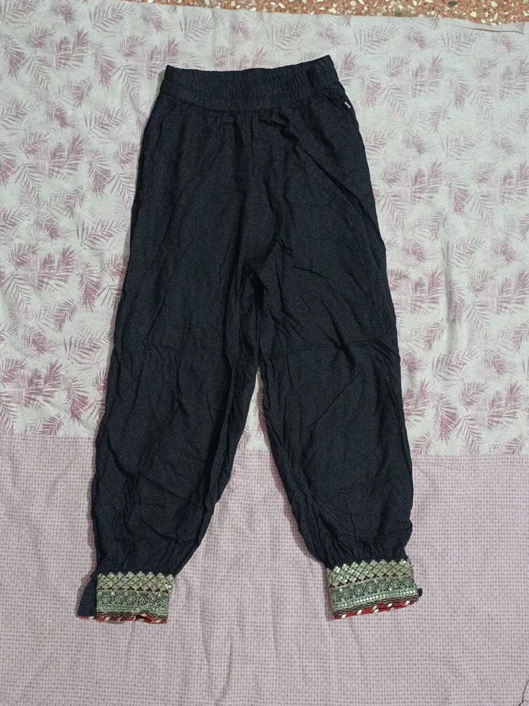 Stylish Black Palazzos with Embellished Cuff