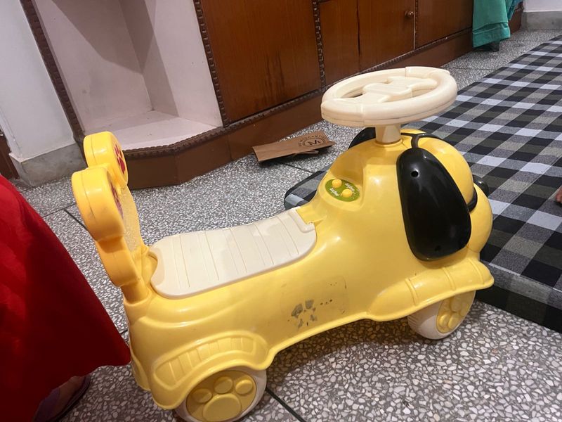 Yellow Dog Ride-On Car