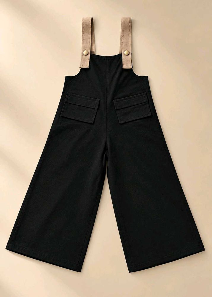 BLACK RIBBED WIDE-LEG DUNGAREES WITH BEIGE STRAPS