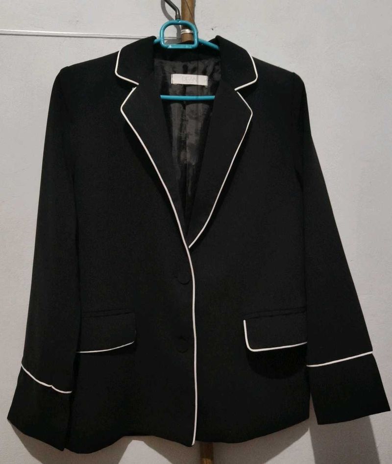 Chic Black Blazer with White Piping