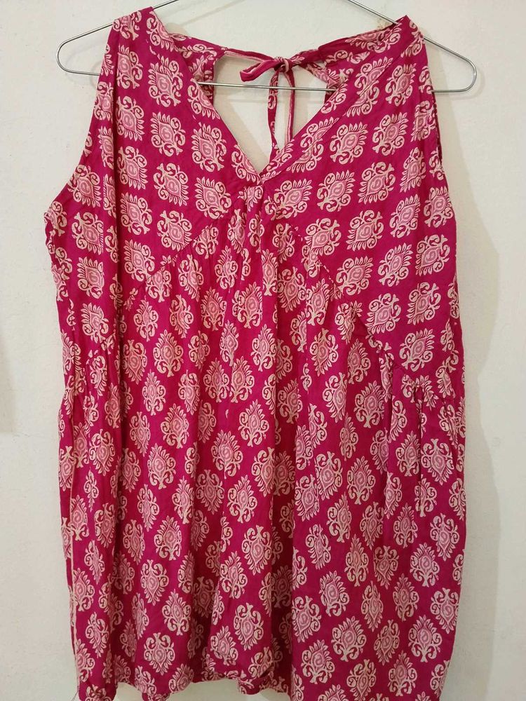 Pink Printed Tie-Up Neck Sleeveless Short Kurti