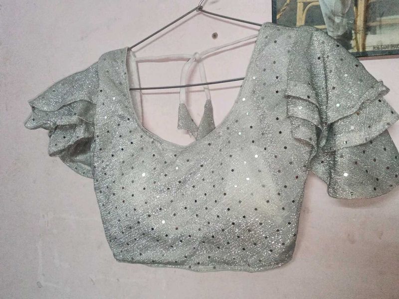 Sparkling Silver Blouse with Ruffle Sleeves