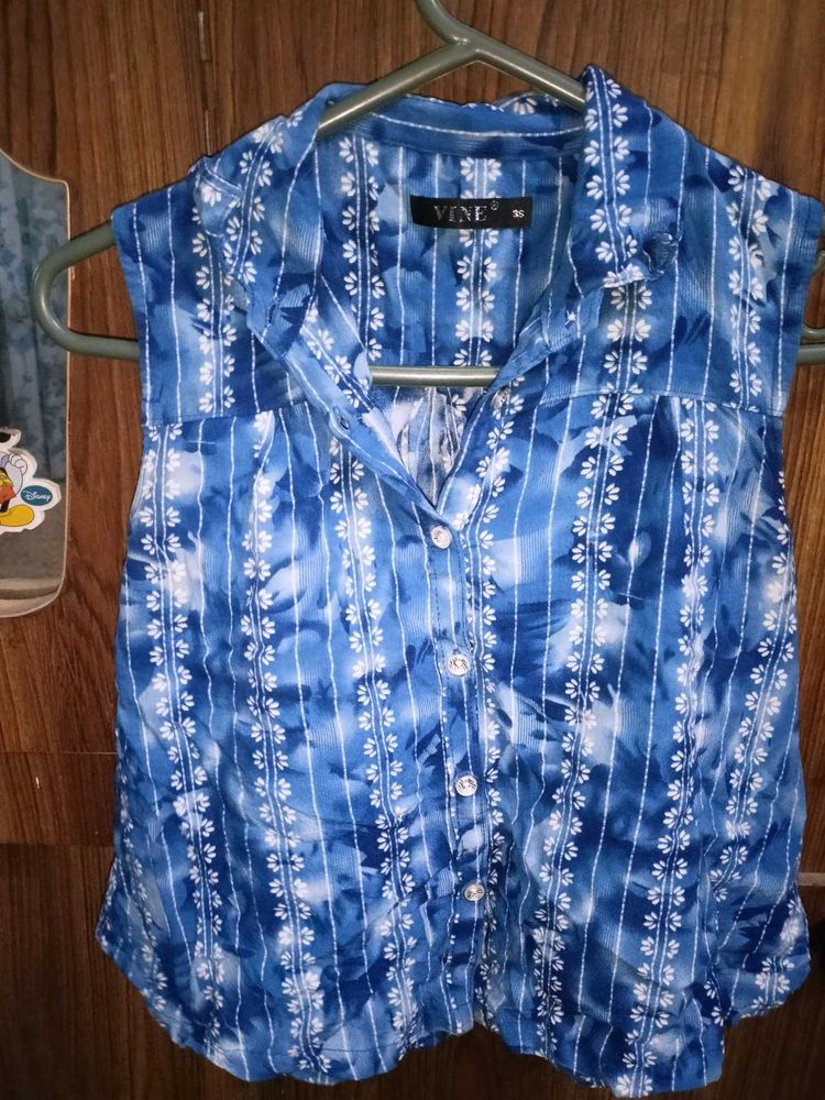 Blue Sleeveless Button-Up Top