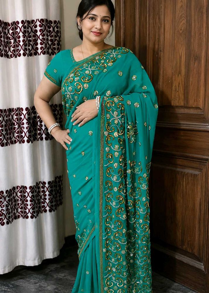 Elegant Teal Embroidered Saree