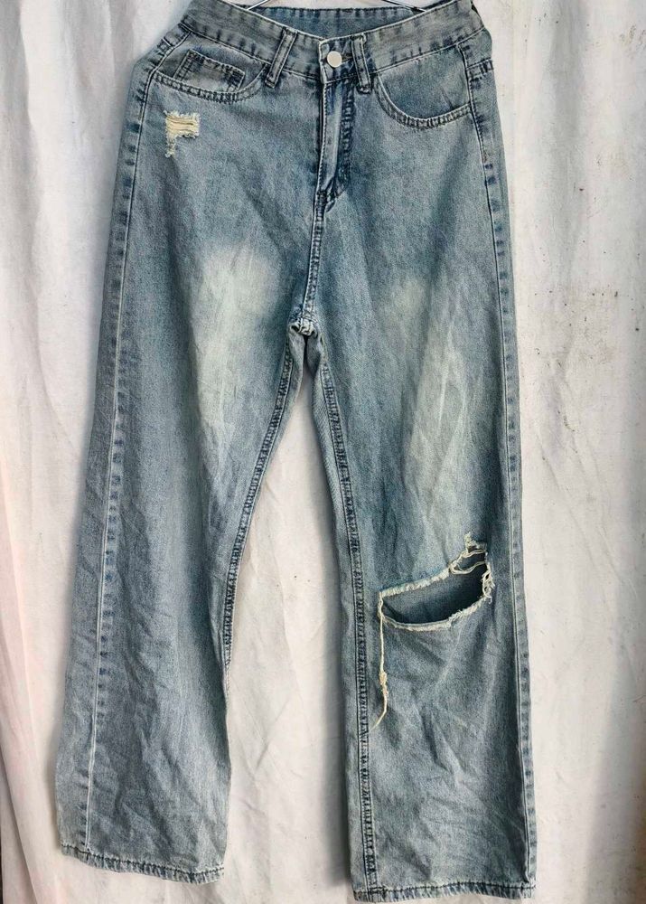 I. Light Wash Ripped Jeans