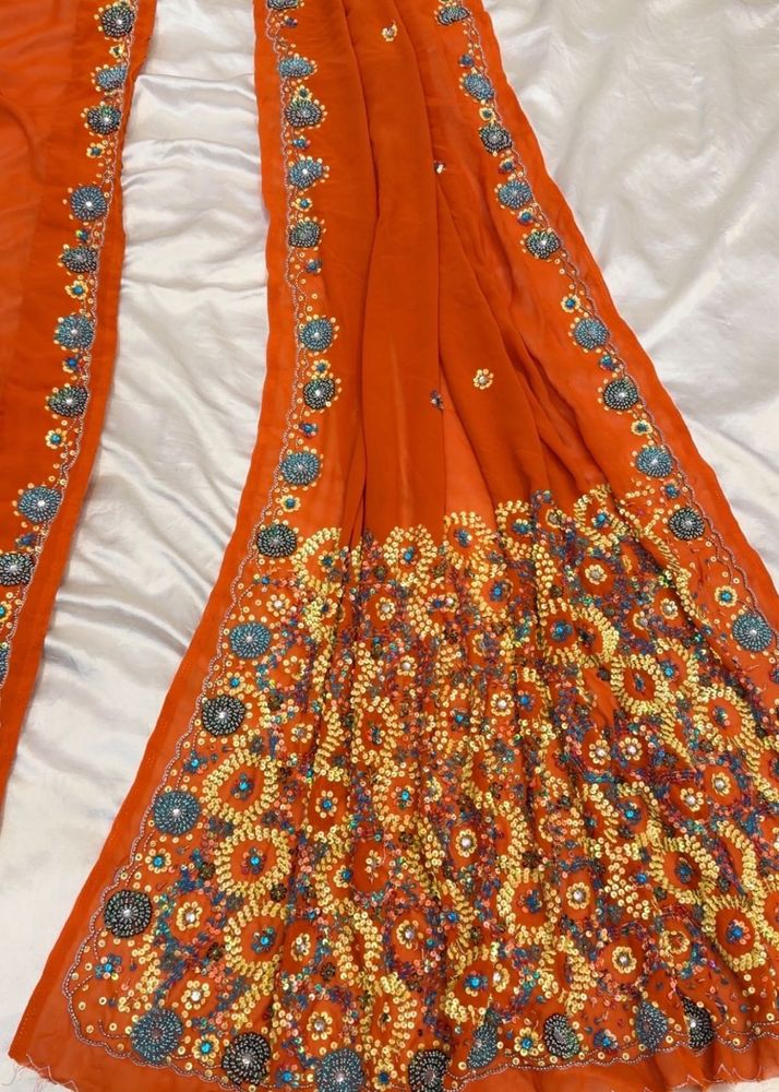 Vibrant Orange Embroidered Saree