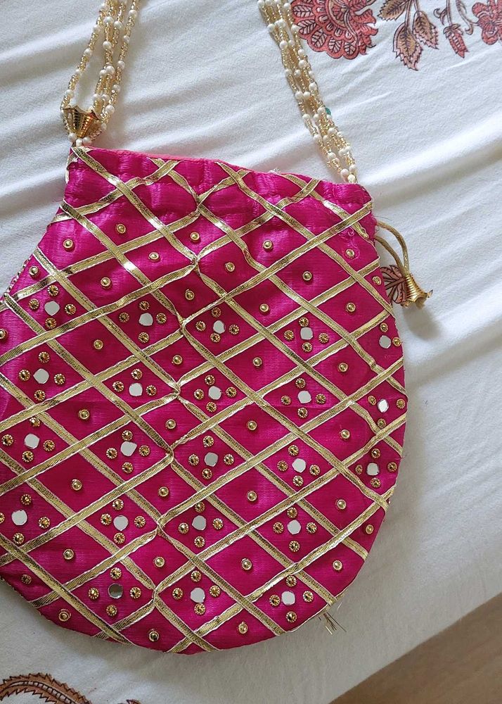 magenta pink potli bag
