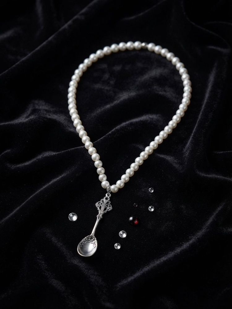 Elegant Pearl Necklace with Spoon Pendant