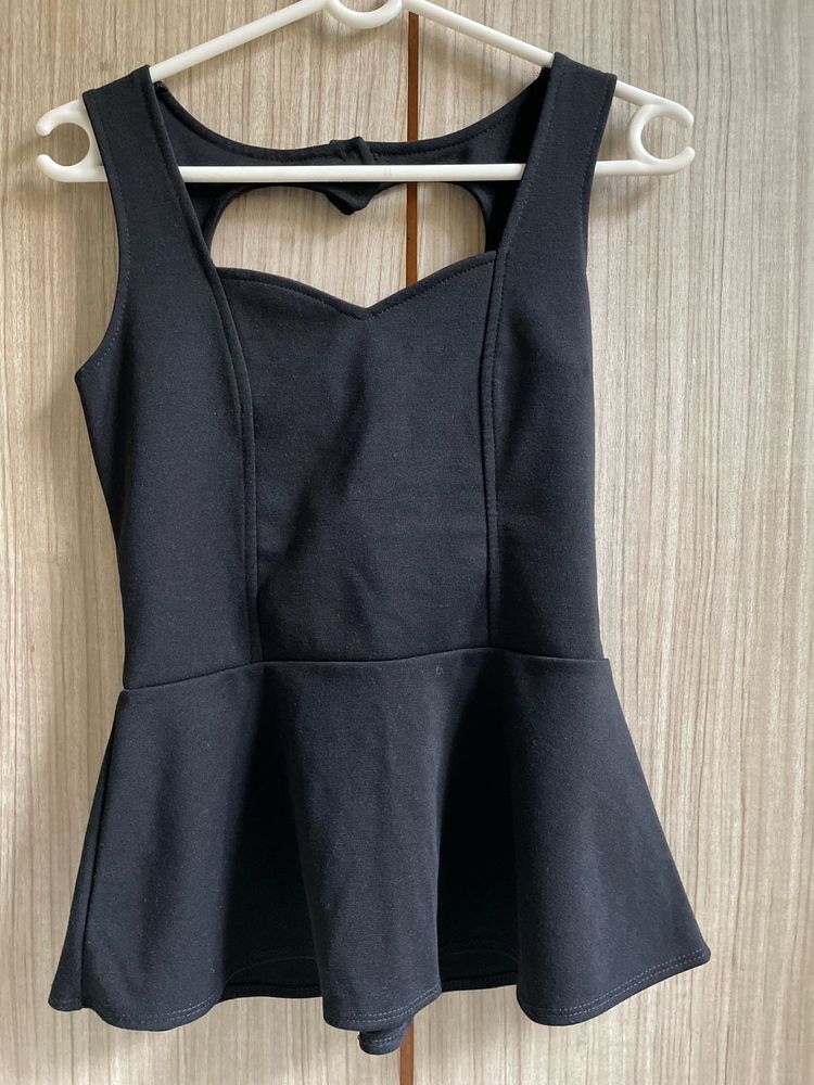 Chic Black Peplum Top with Heart Cutout