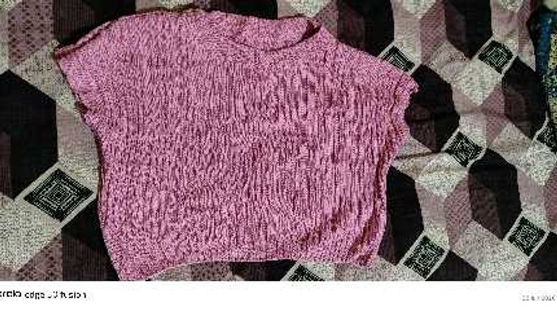 Pink crop top.