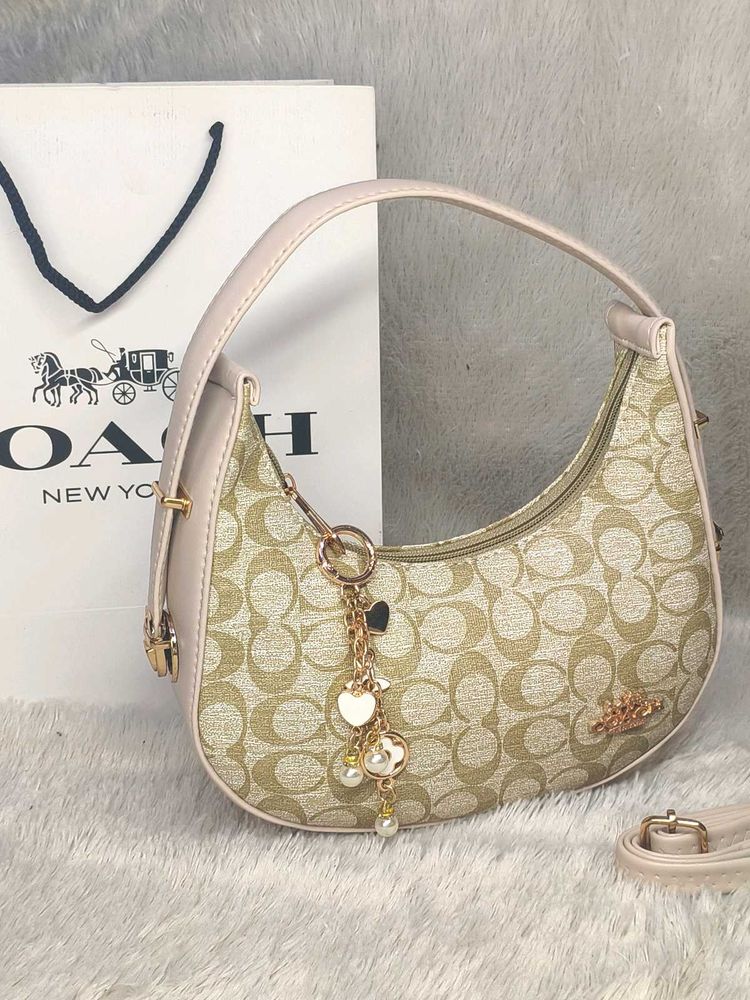 Coach Moon with charm&amp; Carry bag