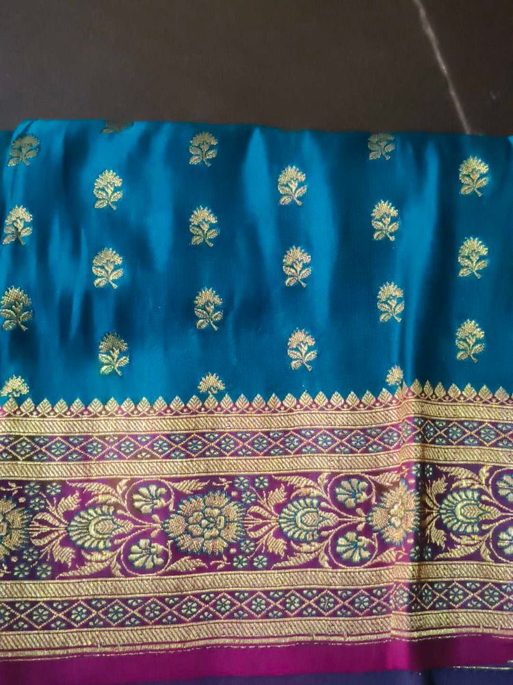 Elegant Teal Silk Saree with Gold Motifs