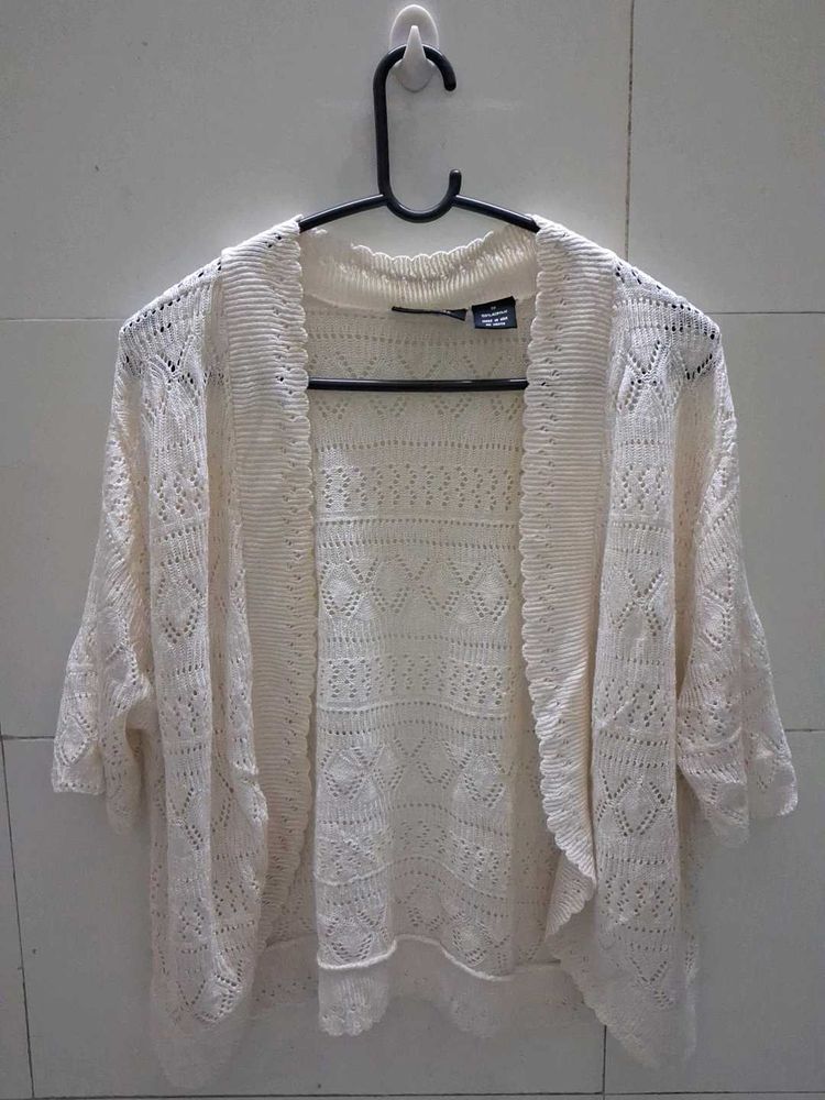 white crochet shrug