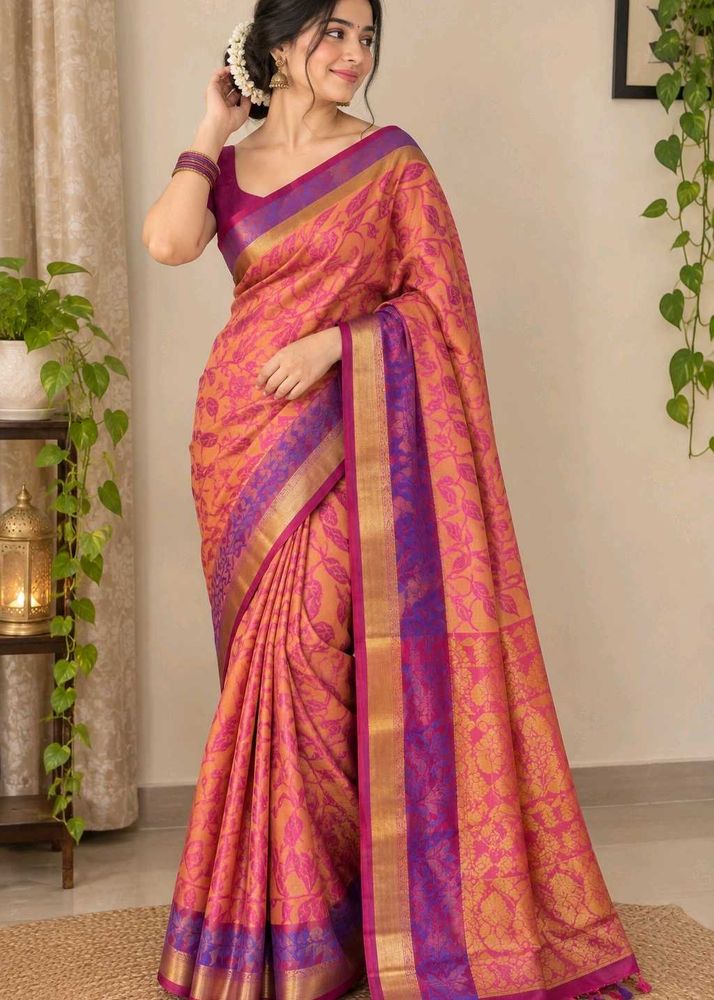 Elegant Pink Saree with Floral Motifs