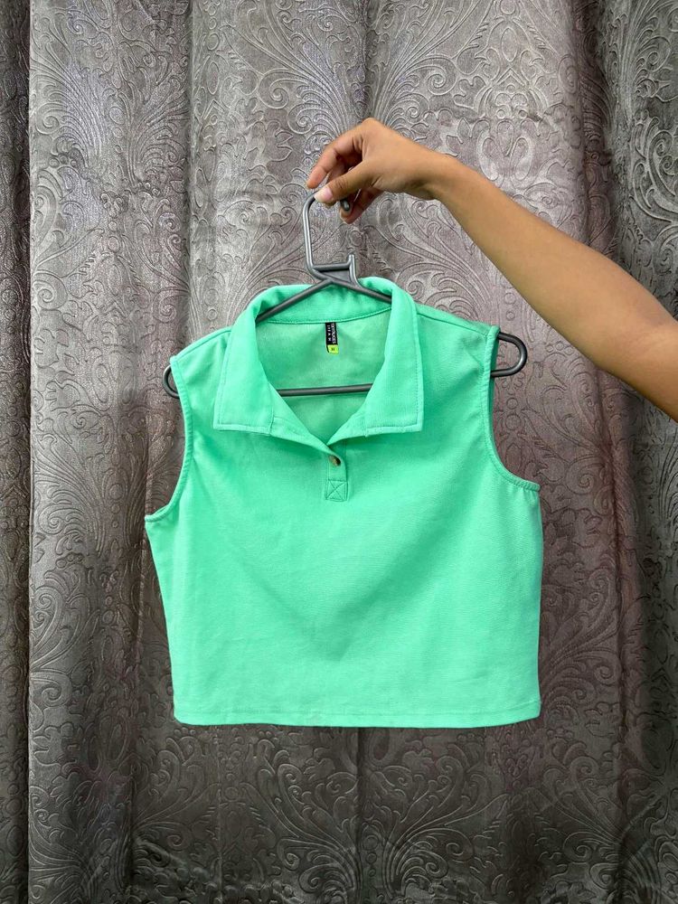 Exported green crop top for office