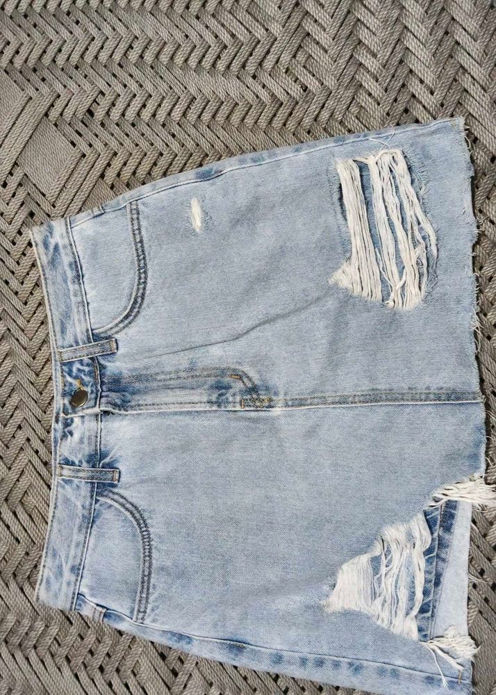 Light Wash Distressed Denim Skirt