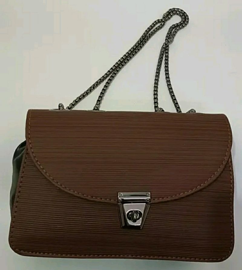 BROWN SOLID BUCKLE CHAIN SLING BAG (TOTALLY NEW)