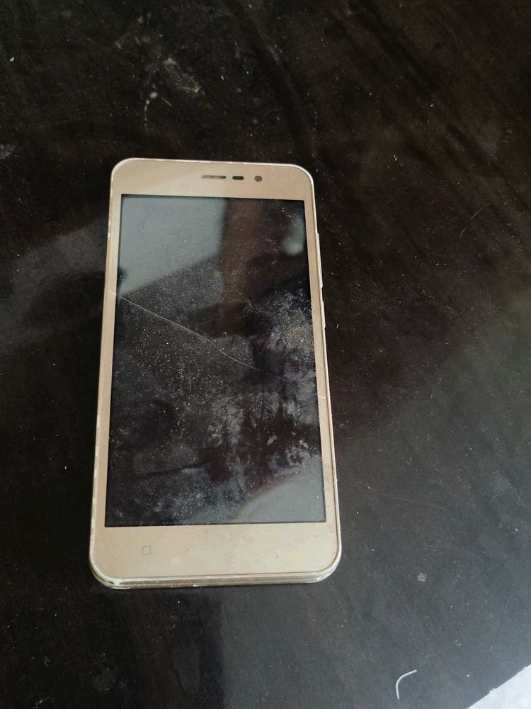 Gold Smartphone with Cracked Screen