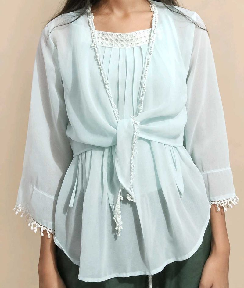 sky blue top with shrug