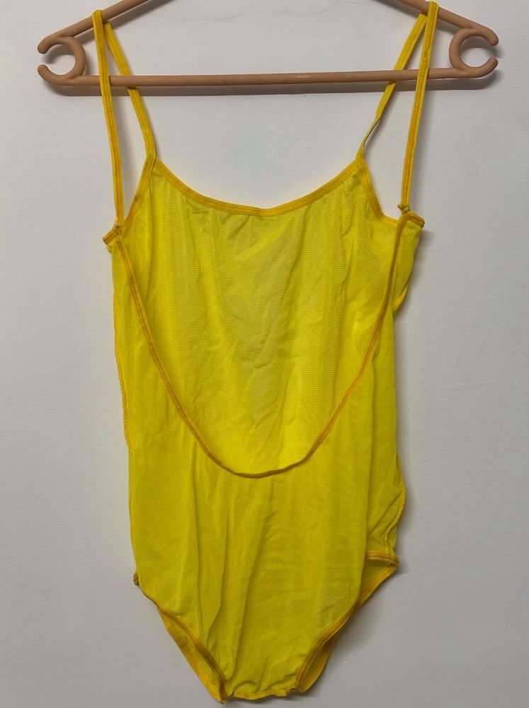 Yellow one-piece swimsuit with a deep scoop back