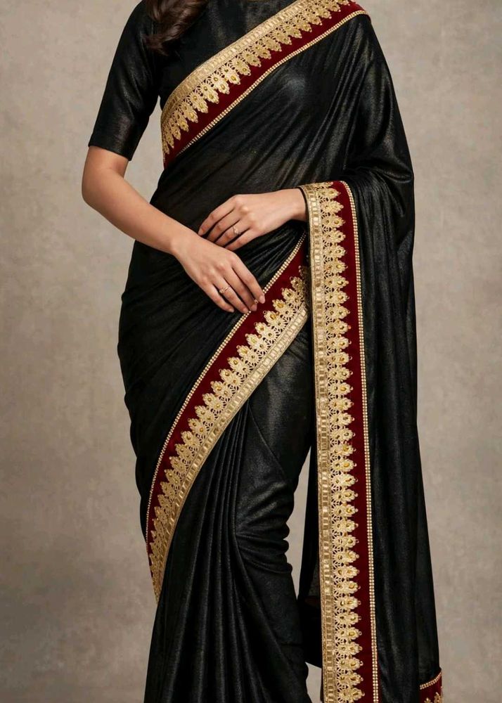 Elegant Black Saree with Gold Border